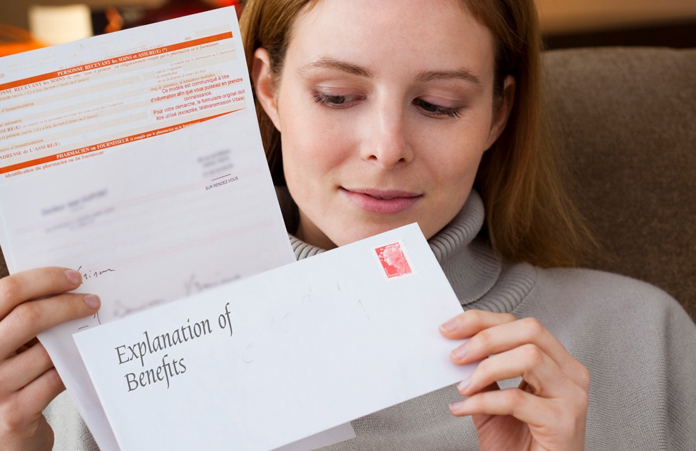 woman receiving an EOB letter