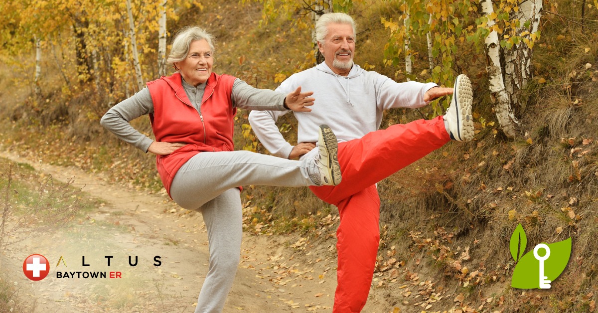 elderly couple stretching
