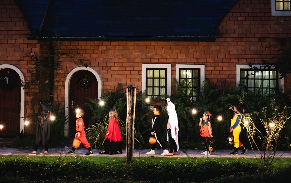 a line of trick or treaters