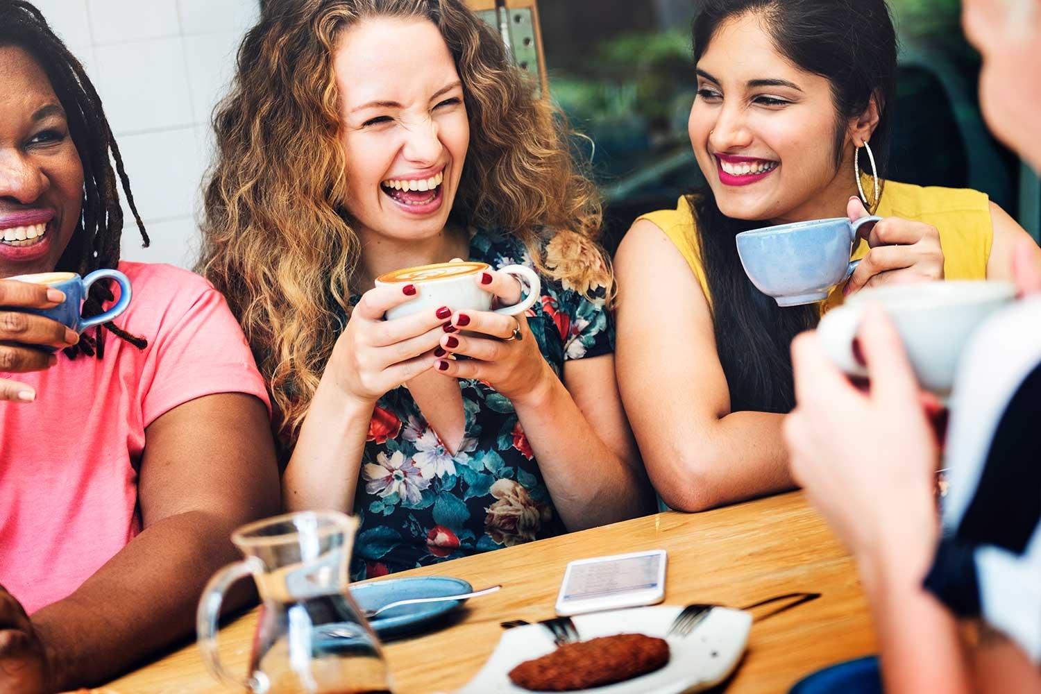 group of women enjoying coffee